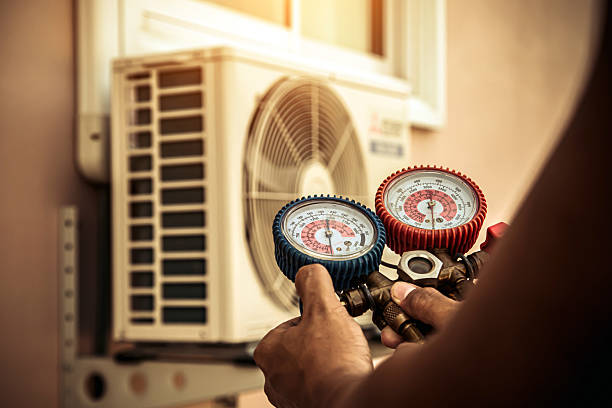 Professional Hvac technician working in Bellwood, PA